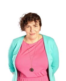 Female in suit smiling at camera